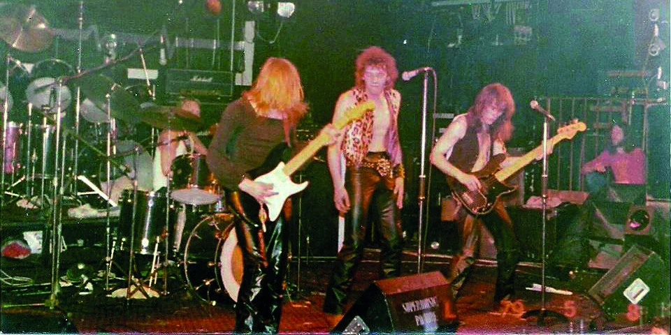 Iron Maiden performing during the early years